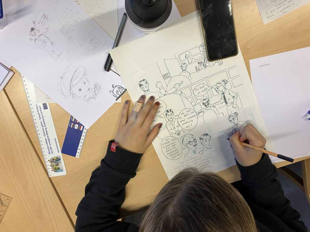 Schülerin im Comic-Workshop